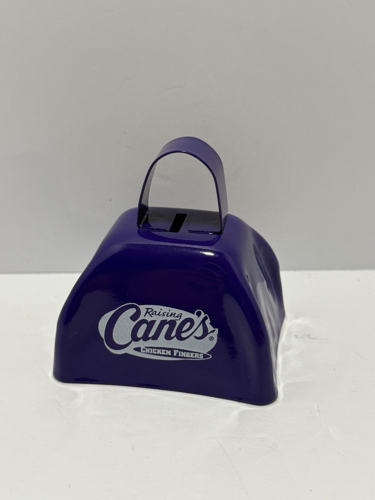 Raising Cane\'s Chicken Fingers Purple/White Cowbell Bell Noisemaker Raising Cane\'s Chicken Fingers Purple/White Cowbell Bell Noisemaker
