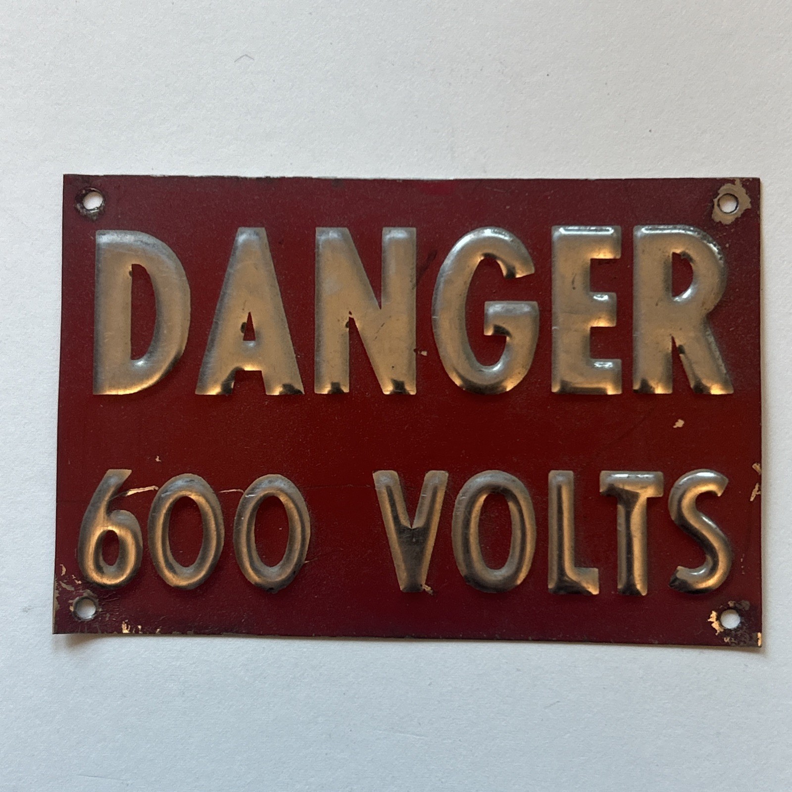 Vintage Bronze locomotive danger 600 volt sign 3in X 4.5in