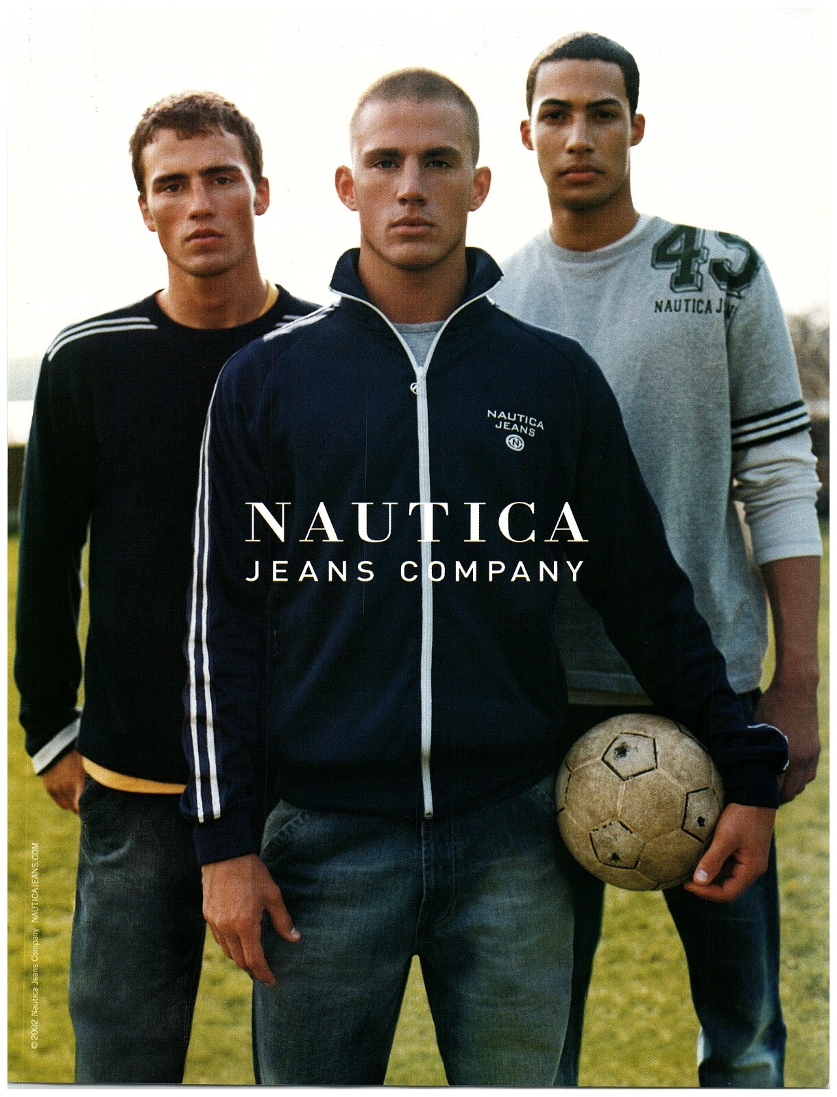 2002 PRINT AD, Nautica Jeans Company Three Soccer Football Players Grass Field