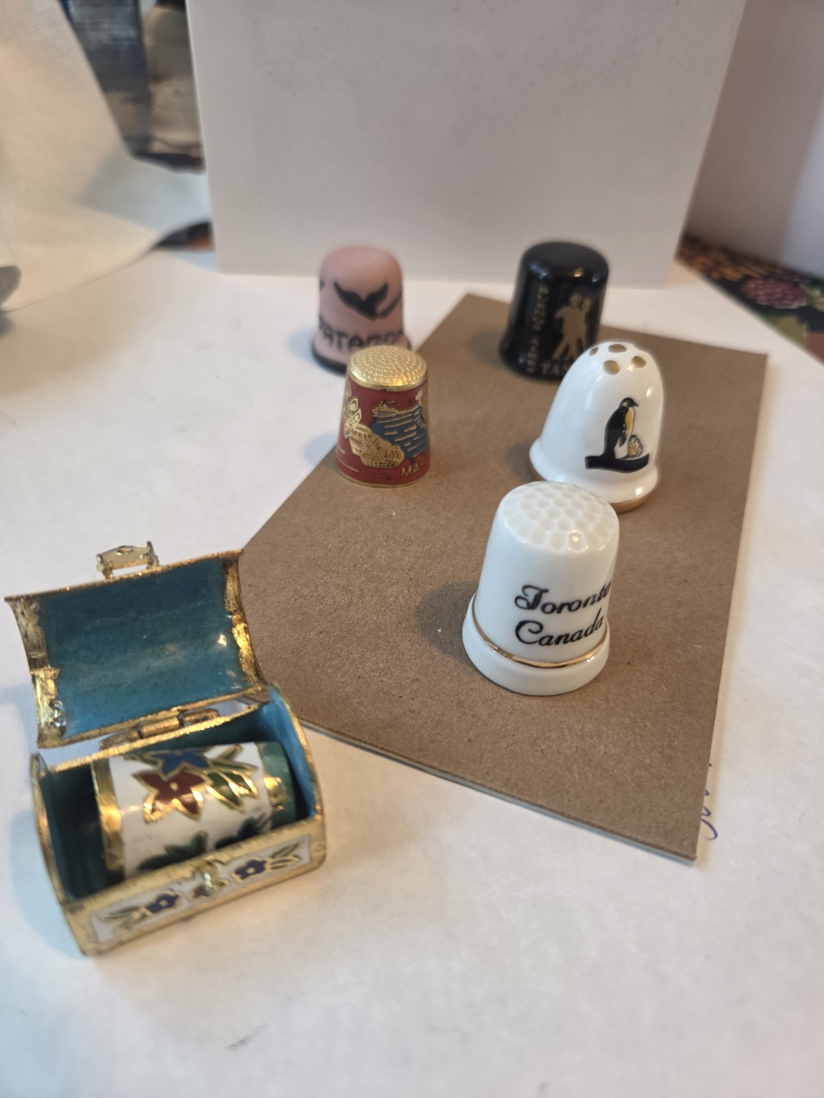 6 Various Porcelain Thimbles. Treasure Chest, From Various Part Of The World