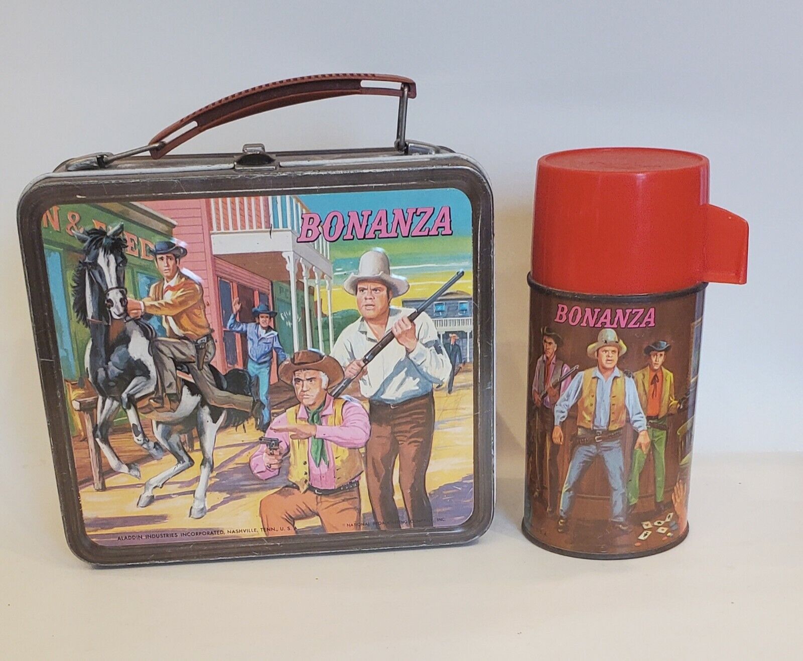 VINTAGE 1960s ALADDIN BONANZA EMBOSSED METAL BROWN BAND LUNCH BOX WITH THERMOS
