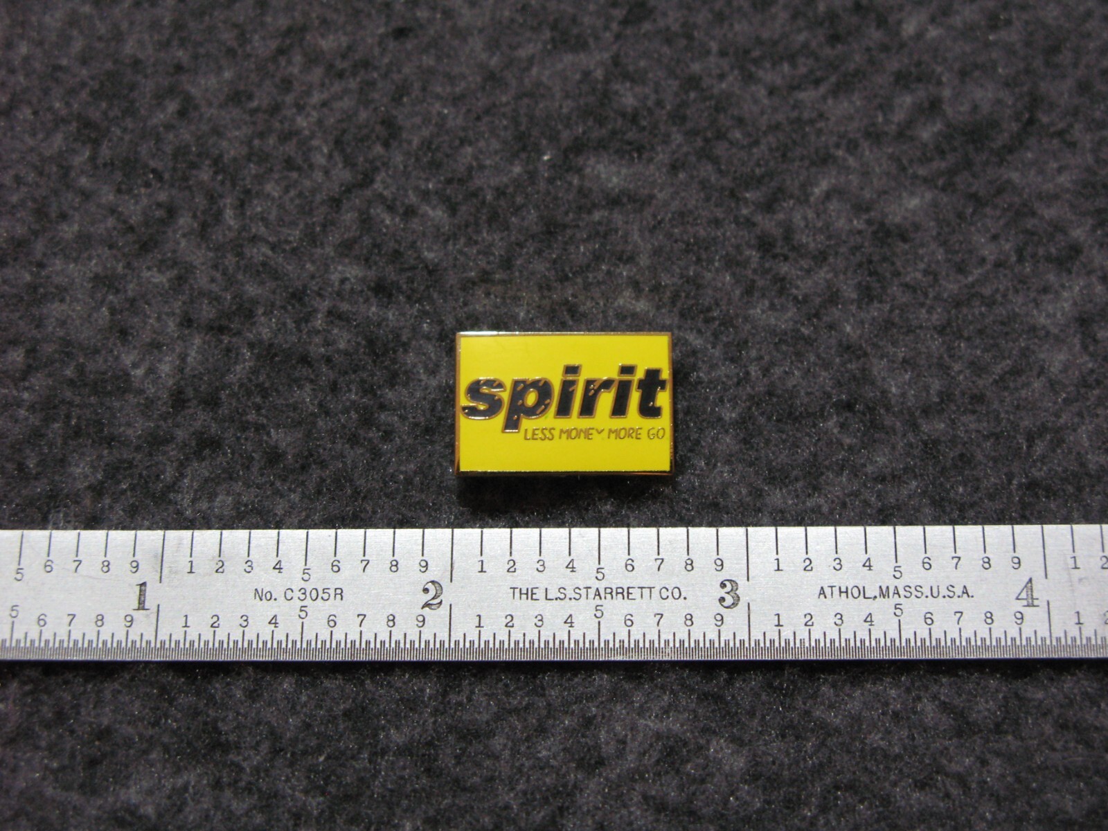 SPIRIT AIRLINES YELLOW LOGO PIN. SPIRIT AIRLINES YELLOW LOGO PIN.