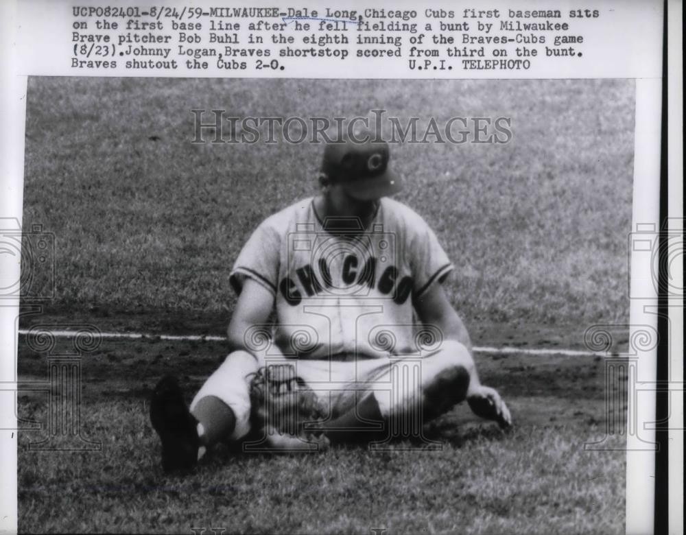 1959 Press Photo Dale Long First Baseman Chicago Cubs Sits On Baseline Braves