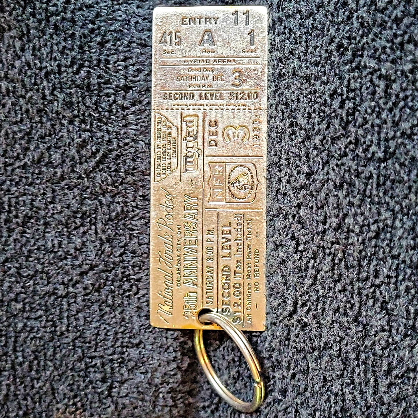 National Finals Rodeo NFR 25th Anniversary Metal Engraved Ticket Keychain Silver