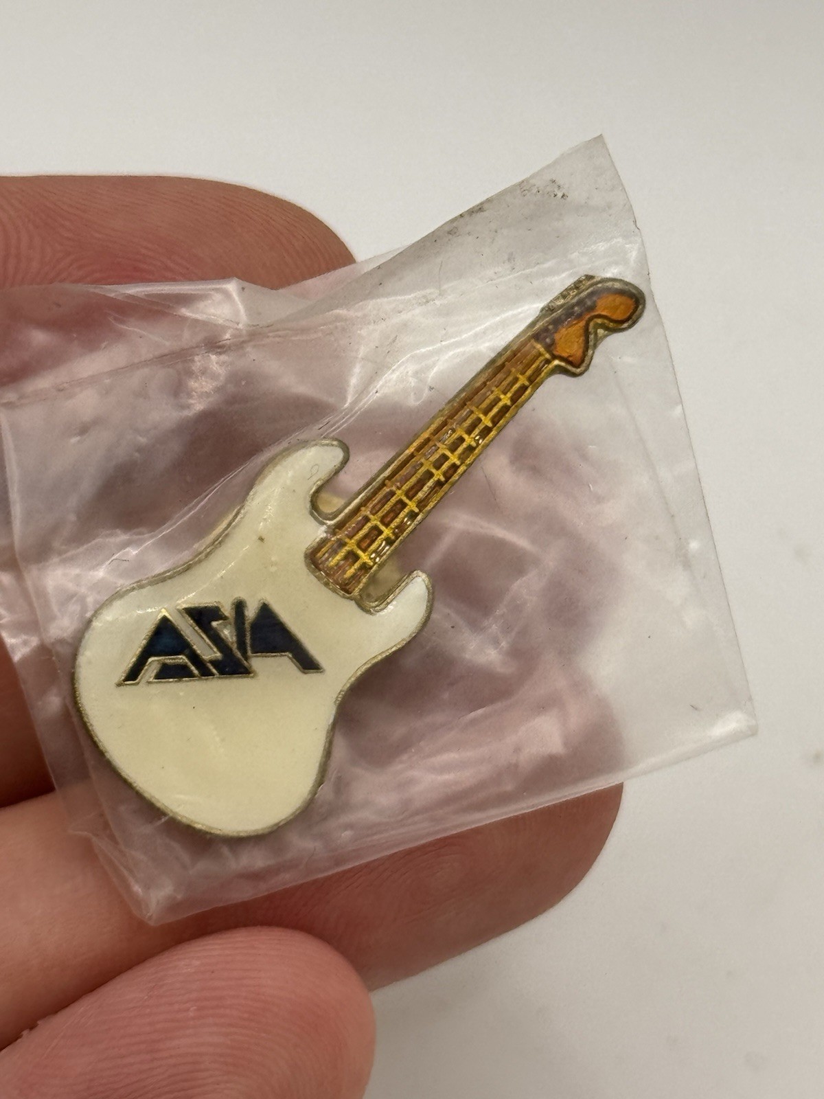 Vintage SEALED Asia Rock Band Logo Guitar Lapel Pin White Blue Metallic Gold