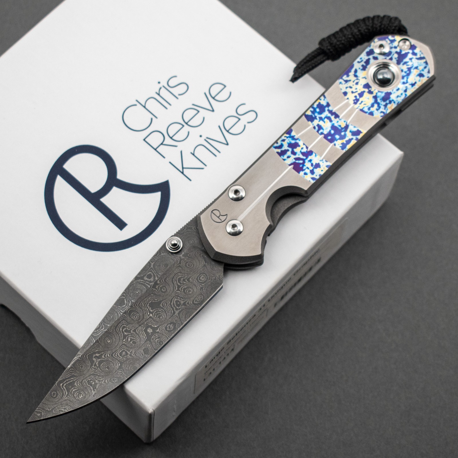 RARE Chris Reeve Large Sebenza 31 Unique Graphic, Raindrop Damascus, Hematite RARE Chris Reeve Large Sebenza 31 Unique Graphic, Raindrop Damascus, Hematite