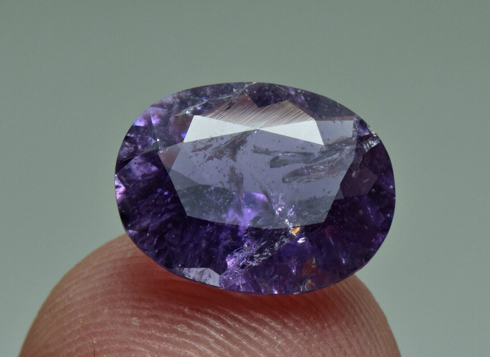 Beautiful Oval Faceted Fluorescent Purple Scapolite Gemstone 2.40 Carat