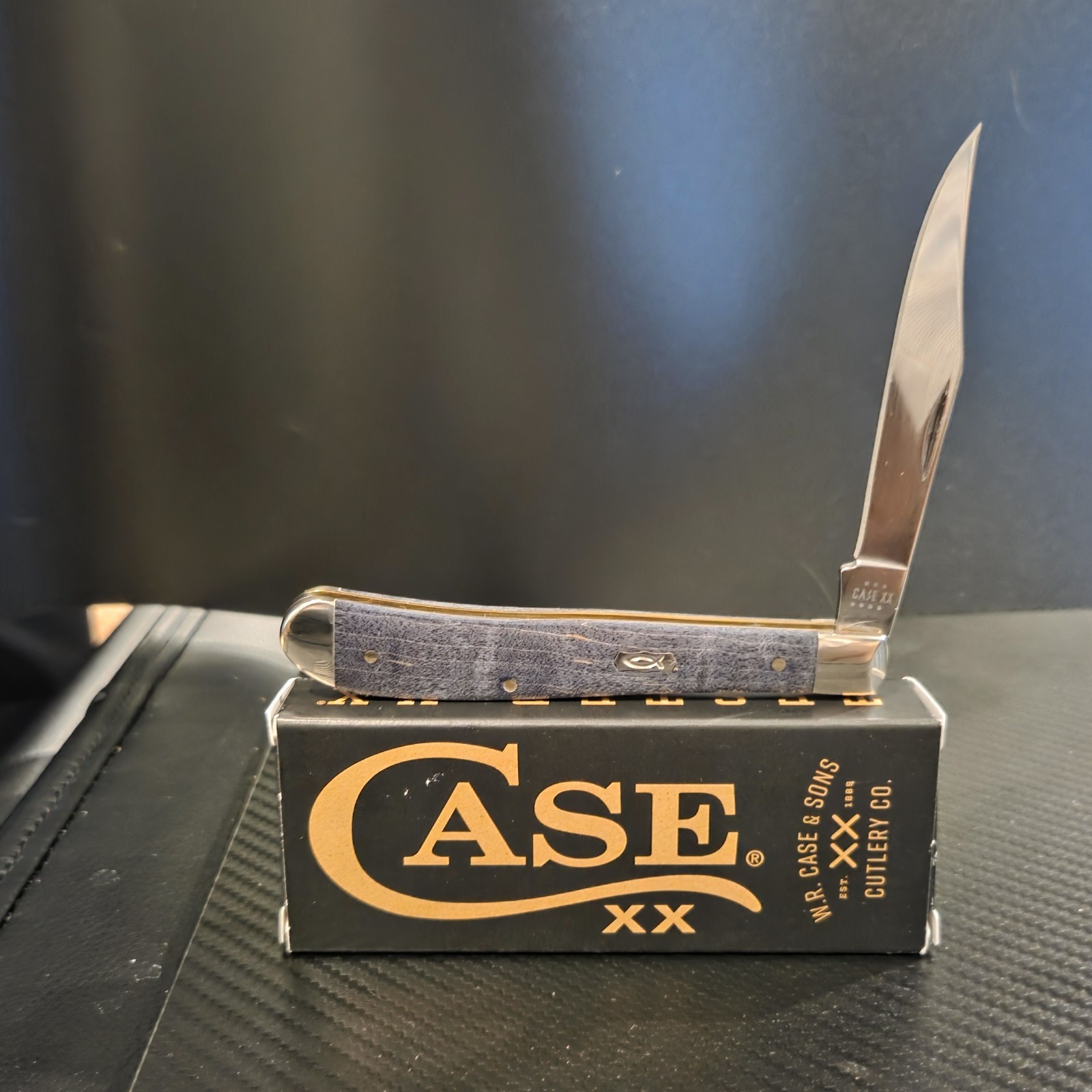 Case Case XX #80546 — Purple Curly Maple Slimline Trapper with the Ichthus