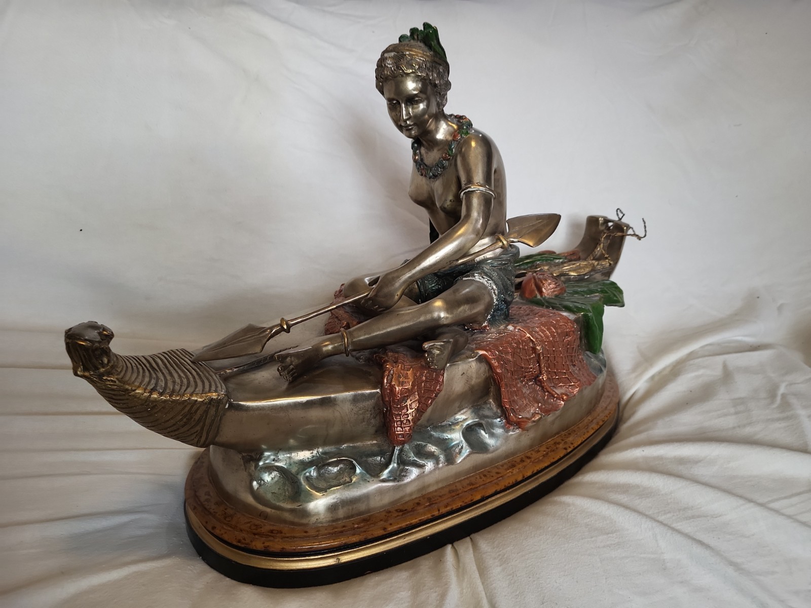 bronze sculpture statue girl on the boat by   C. M, Russell