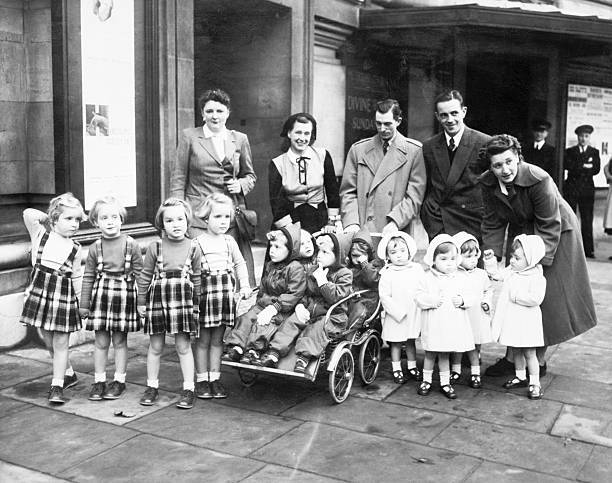 London England One set quadruplets unusual enough but three sets sa- 1952 Photo