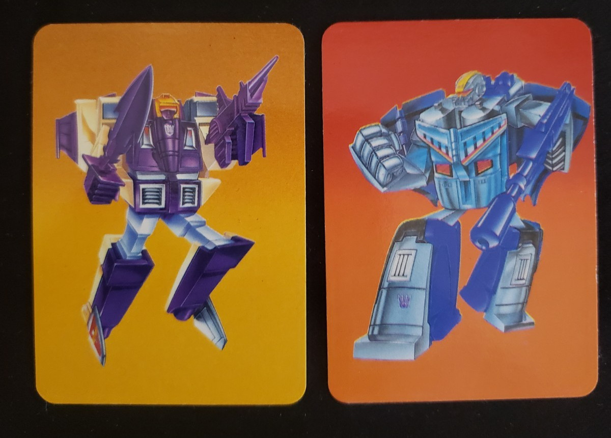Two cards 1985 Hasbro Transformers Card #111 Blitzwing #110 Astrotrain ORANGE