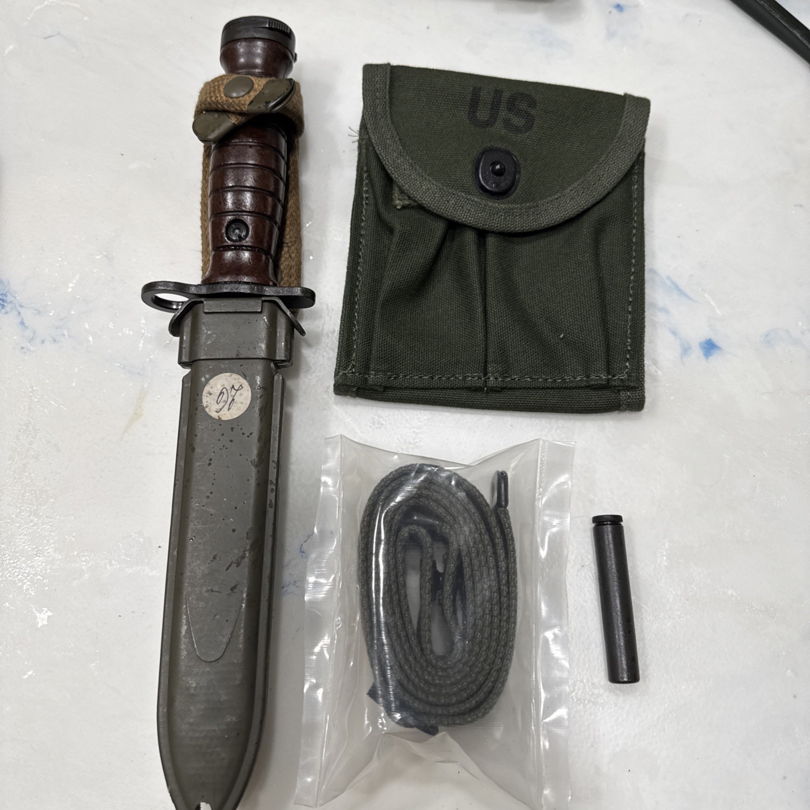 M1 Carbine Kit 1955 Italian MFG Bayonet, Oiler. Repo Sling, And Stock Mag Pouch. M1 Carbine Kit 1955 Italian MFG Bayonet, Oiler. Repo Sling, And Stock Mag Pouch.