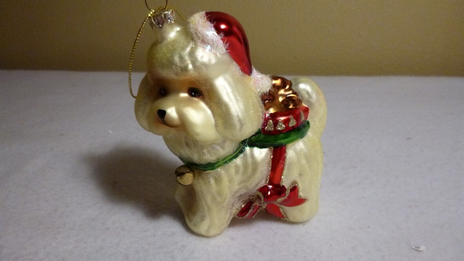 Glass Ornament - White/Yellow DOG w ribbons and bows and a red Santa hat - MINT