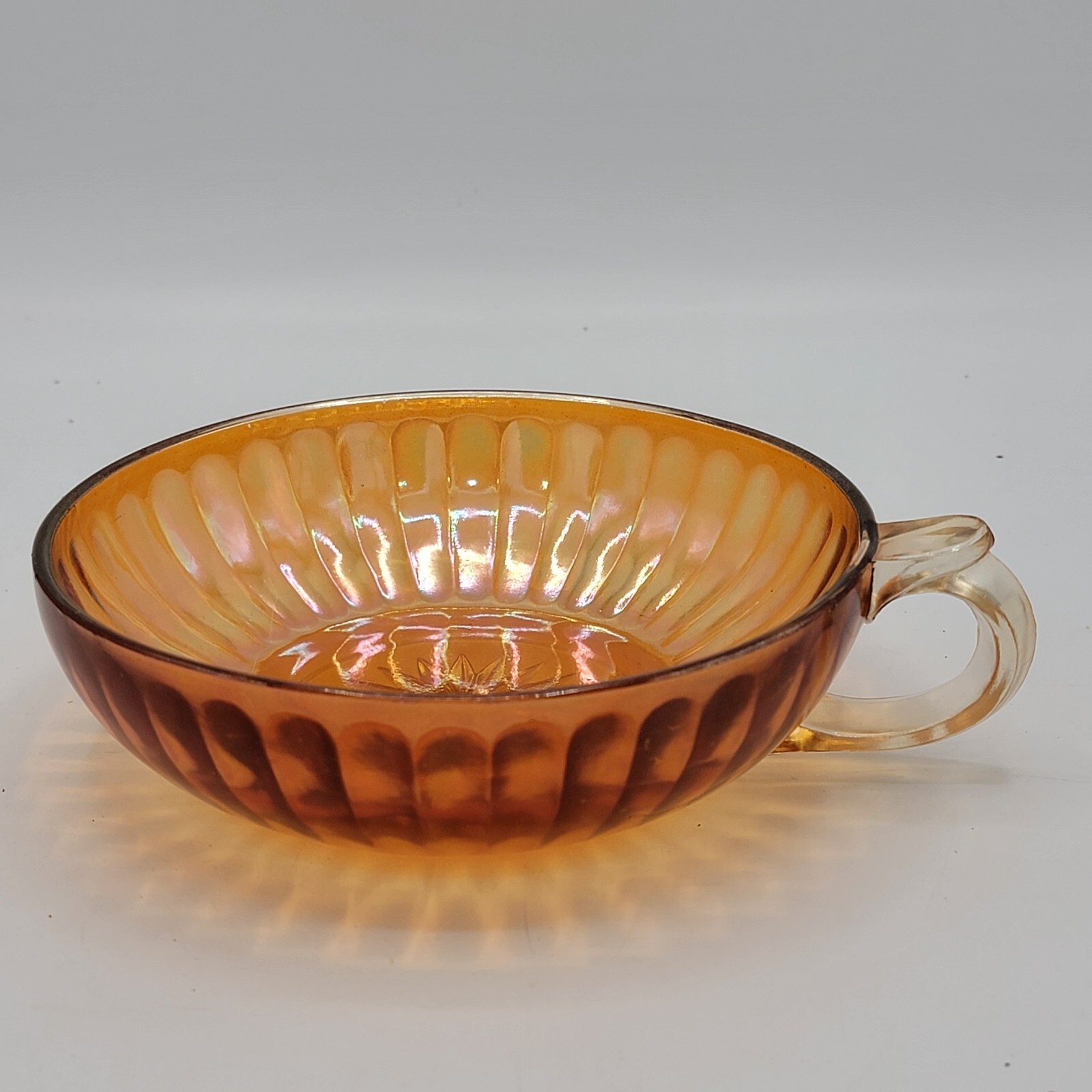 Imperial Carnival Glass Pillar Fluted Iridescent Marigold Bowl With Handle 5.5” Imperial Carnival Glass Pillar Fluted Iridescent Marigold Bowl With Handle 5.5”