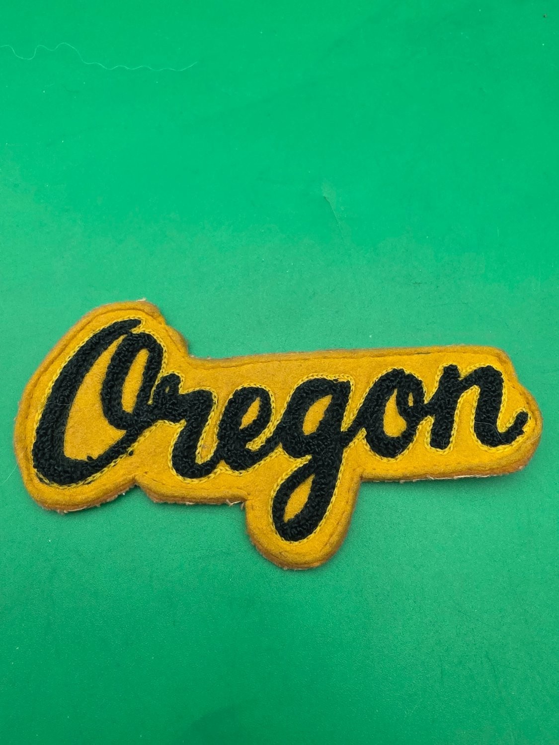 Vintage Oregon Ducks Chenille Letterman Jacket Patch Script Yellow Black Felt