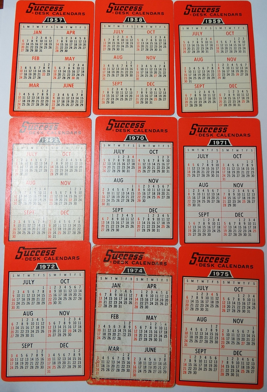 LOT 9 SUCCESS DESK ADVERTISING POCKET CALENDAR 1957-58-59-62-70-71-72-74-75