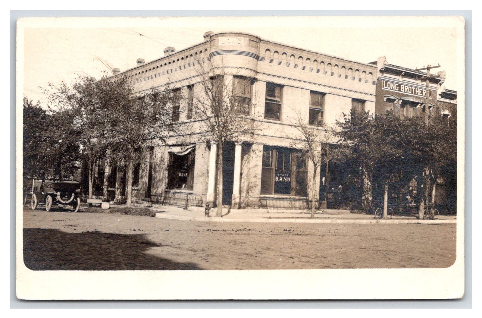FREDONIA Kansas KS ~ 1909c ~ LONG BROTHERS Building ~ 6th St & Monroe RPPC