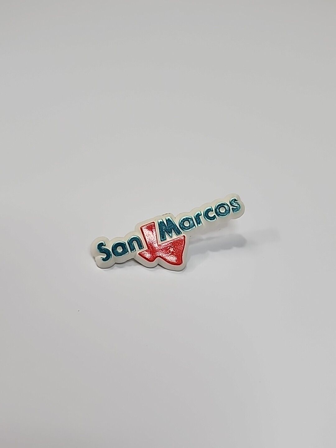 PLASTIC San Marcos Texas Travel Souvenir Lapel Pin Hard 