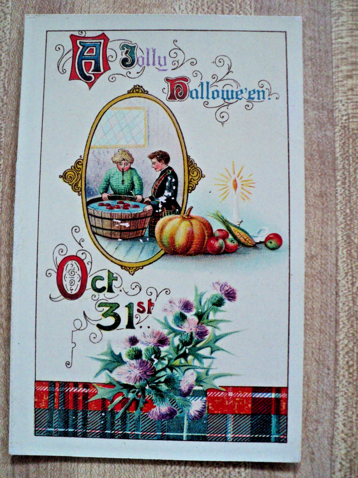 HALLOWEEN a Couple Bobbing for Apples vintage Gottschalk #2504 Postcard