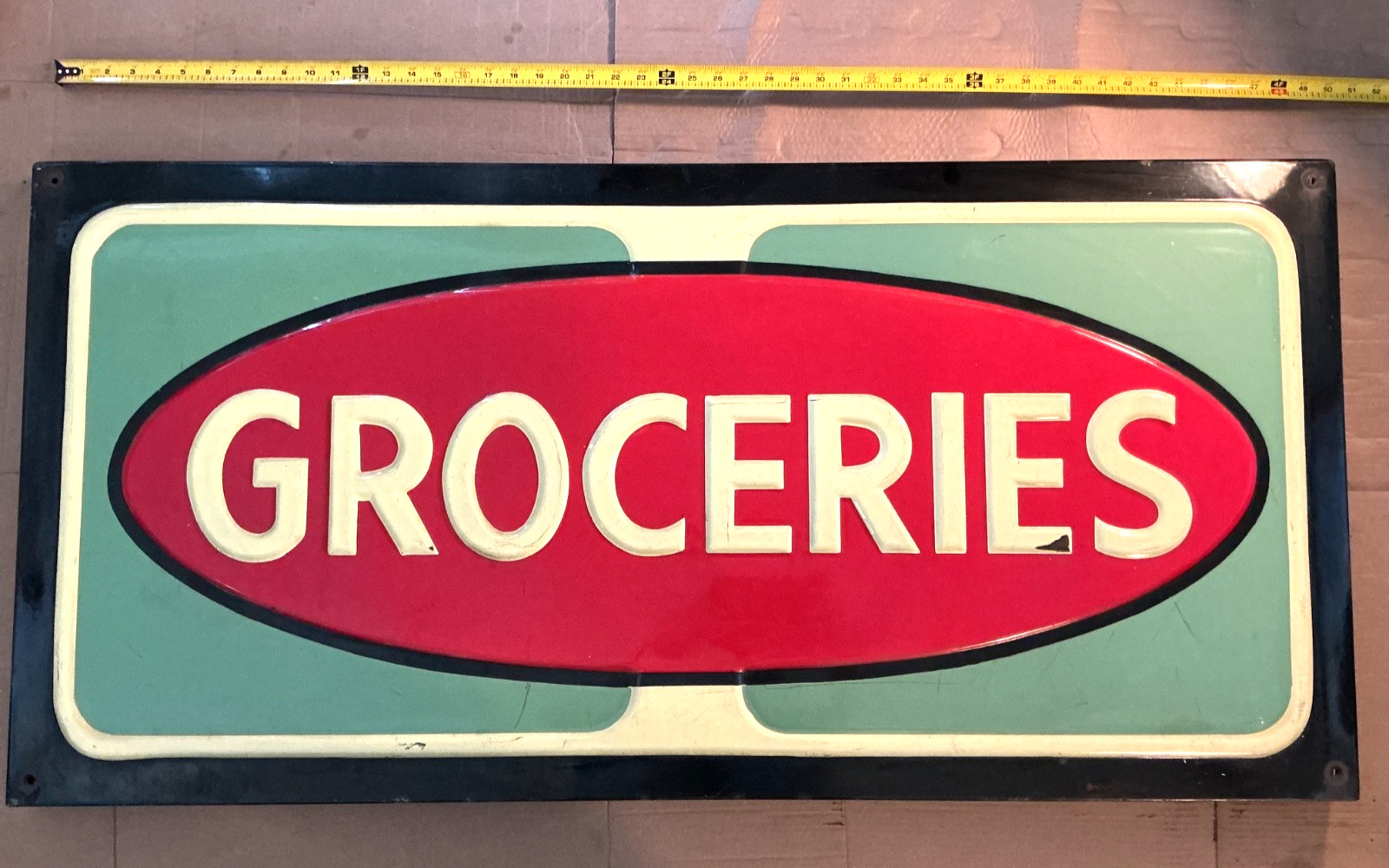 VINTAGE 1930’s-1950’s EMBOSSED PORCELAIN GROCERIES ADVERTISING SIGN - 24” X 50” VINTAGE 1930’s-1950’s EMBOSSED PORCELAIN GROCERIES ADVERTISING SIGN - 24” X 50”
