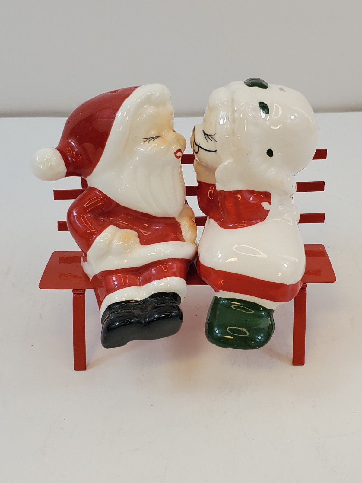 Vintage Christmas Kissing Santa & Mrs. Claus Ceramic Figurines Sitting on Bench