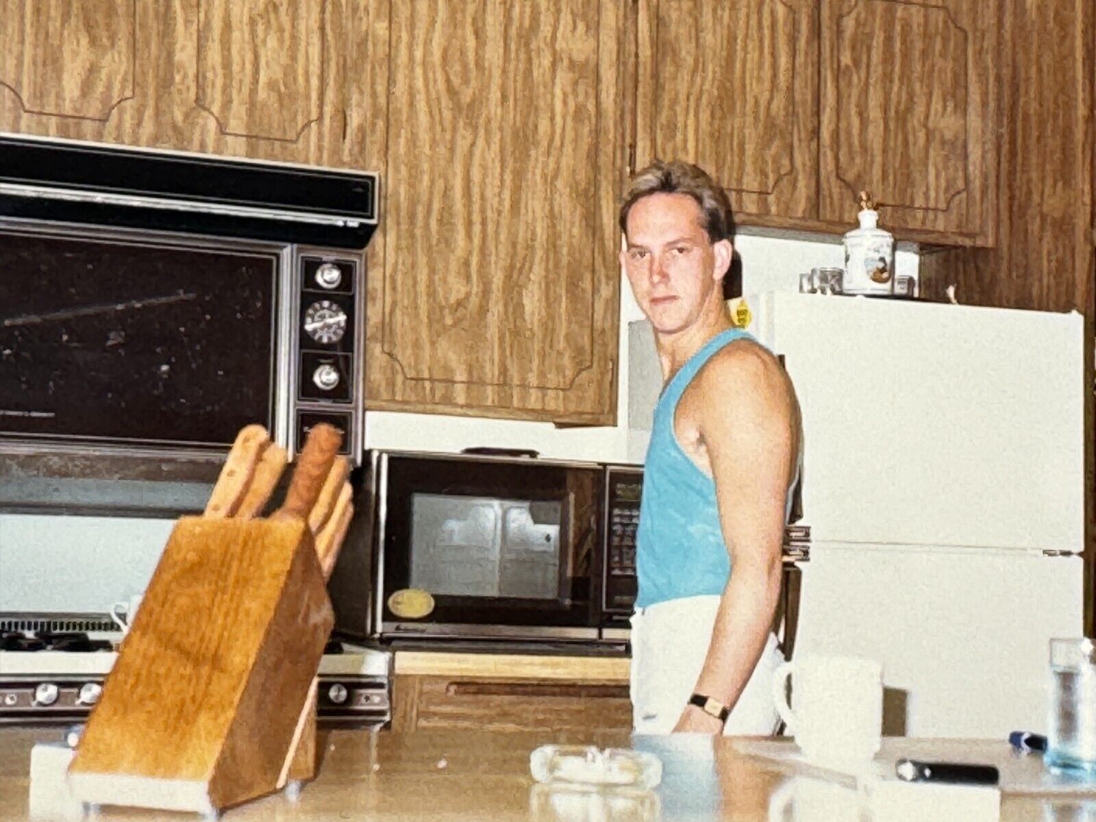 2A Photograph Handsome Man Candid Snapshot Tank Top Kitchen 1980's