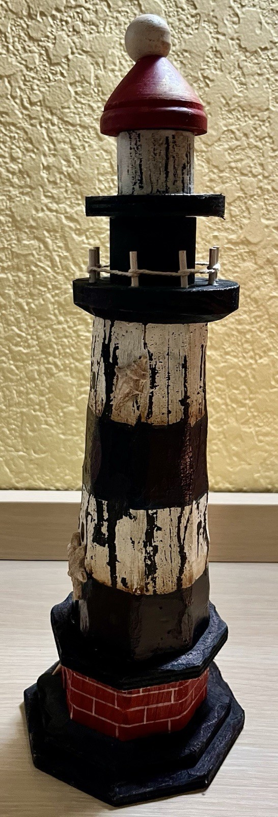 mini replica of the Frankfort North Breakwater Lighthouse in Frankfort, MI