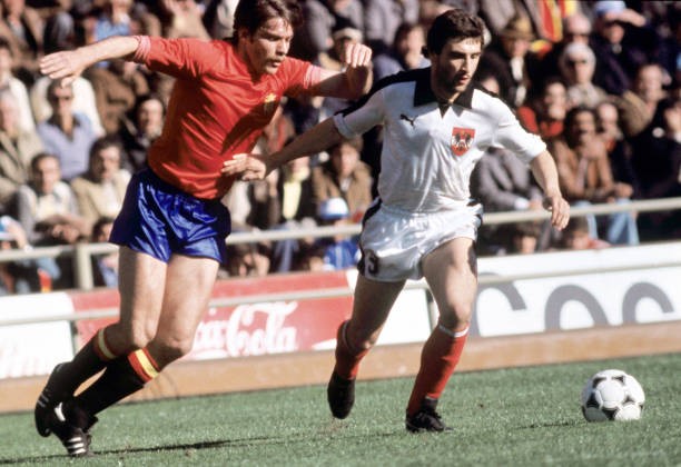 Austrian striker Hans Krankl fighting against a Spanish opponent A- Old Photo