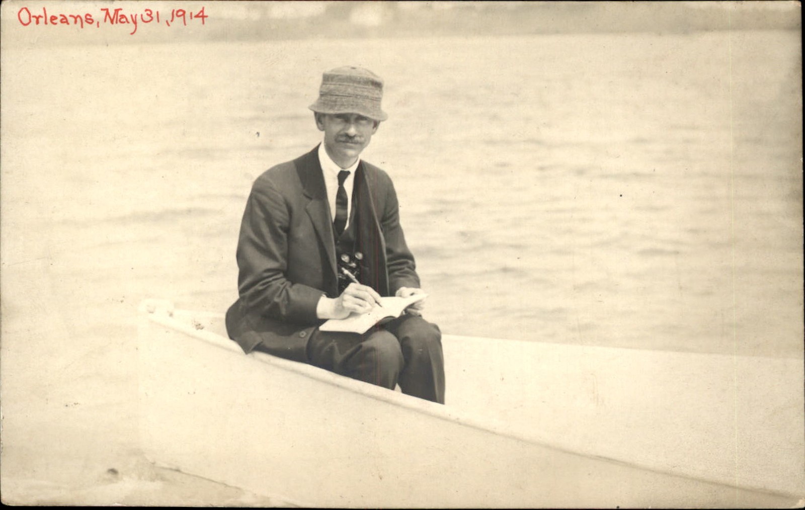 Orleans Cape Cod Man in Boat Writing in Notebook c1910 Real Photo Postcard bhn