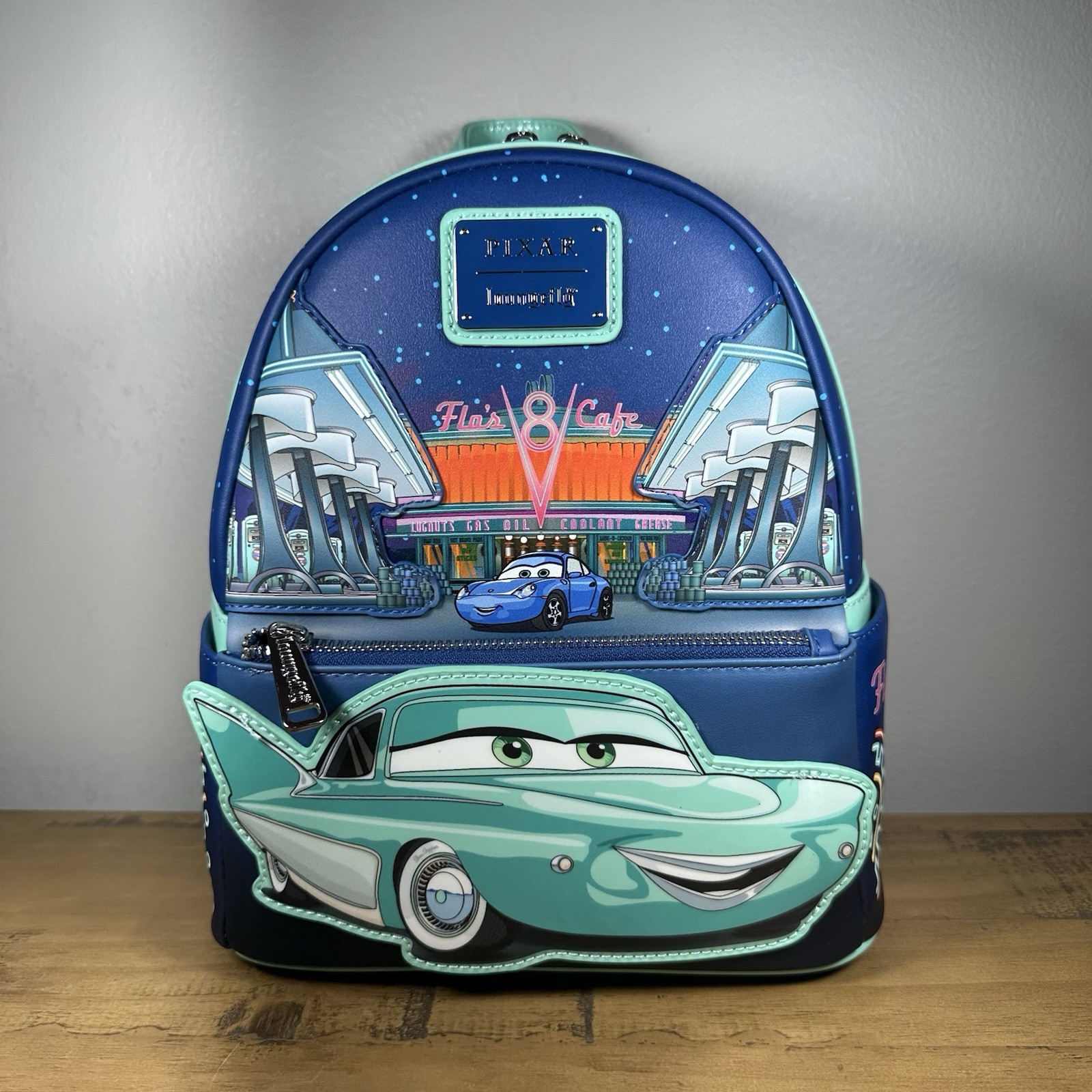 Loungefly Disney Pixar Cars Flo’s Cafe Glow In The Dark Mini Backpack NWT Loungefly Disney Pixar Cars Flo’s Cafe Glow In The Dark Mini Backpack NWT