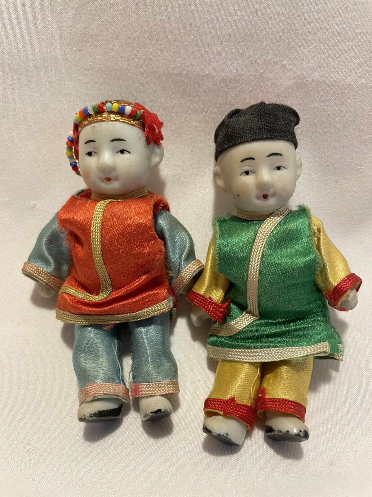 vintage miniature jointed bisque Chinese dressed pair of dolls