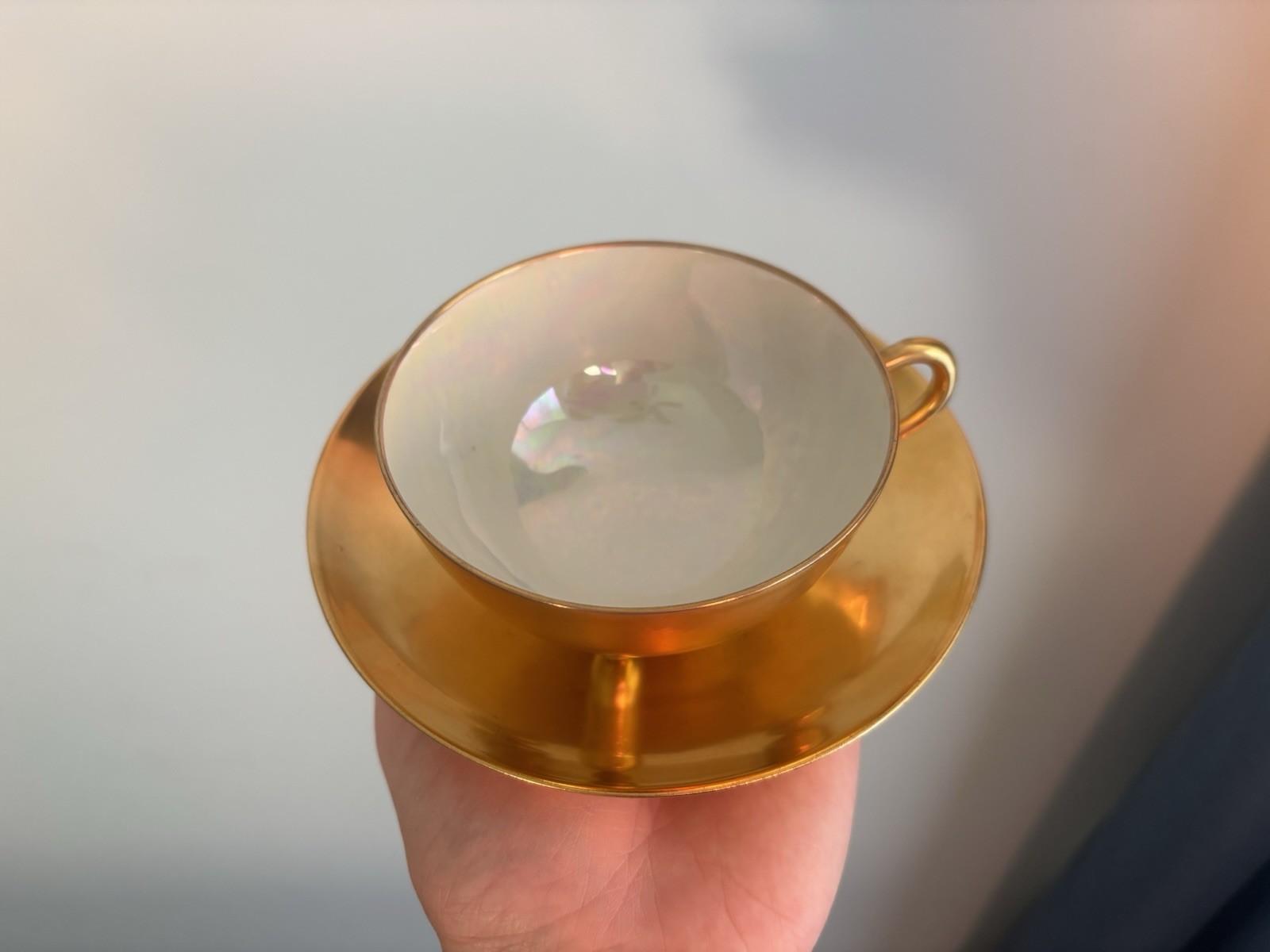Havilland Limoges Three-Footed 24-karat gold plated porcelain TeaCup and Saucer