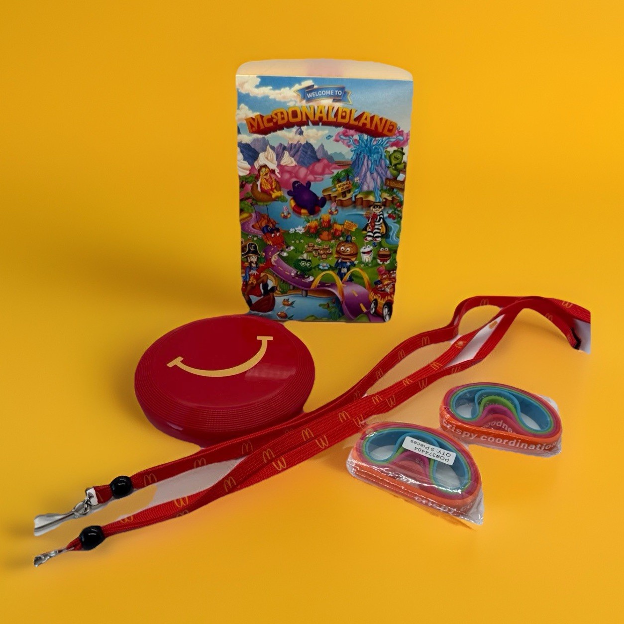 2025 McDonald's The McDonaldLand Adult Happy Meal Tin's LOT Promos Wristbands