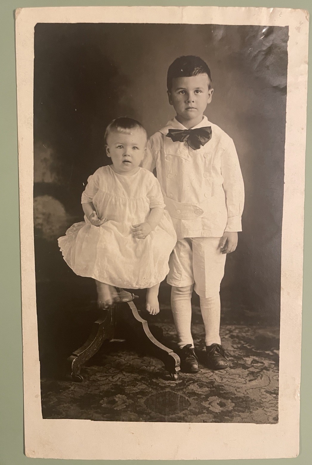 Rppc 1920c Two Children Studio Posing AZO Vintage Postcard Large Bow tie 