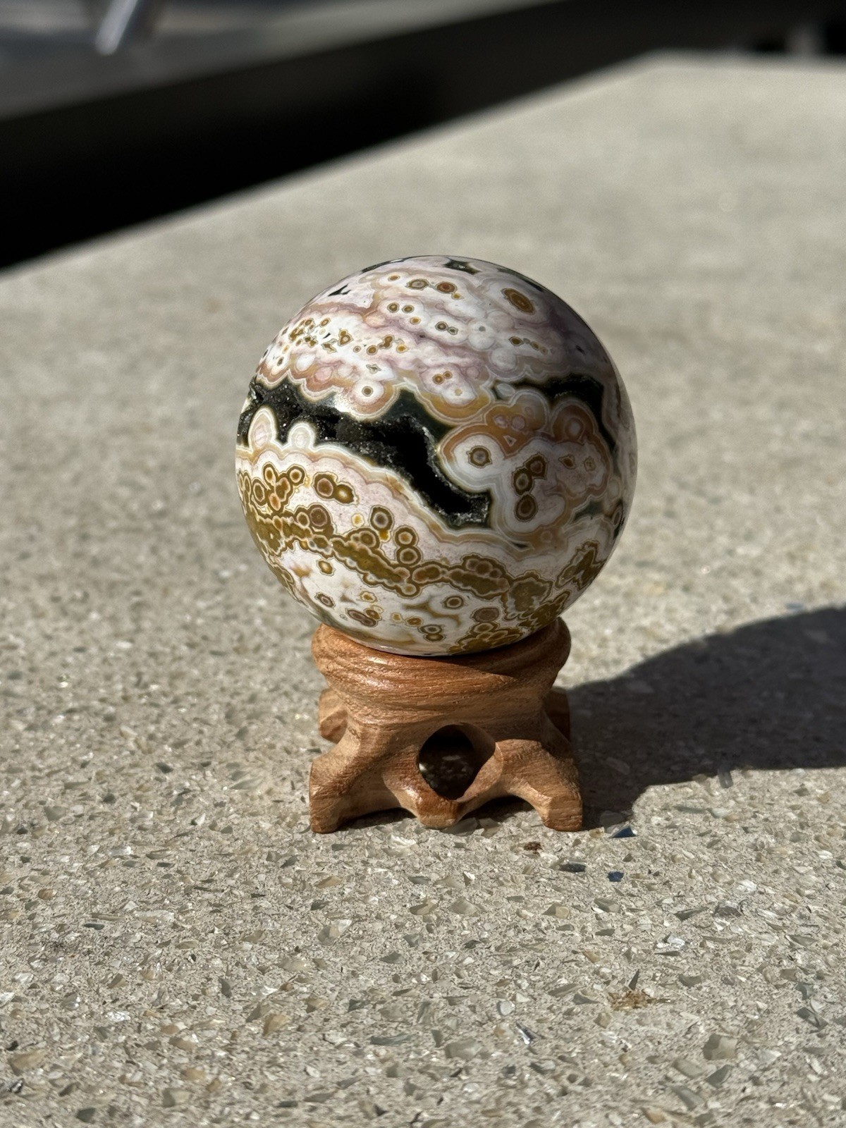 Ultra Rare 8th Vein Ocean Jasper Sphere Crystal With Wooden Stand 50mm Ultra Rare 8th Vein Ocean Jasper Sphere Crystal With Wooden Stand 50mm