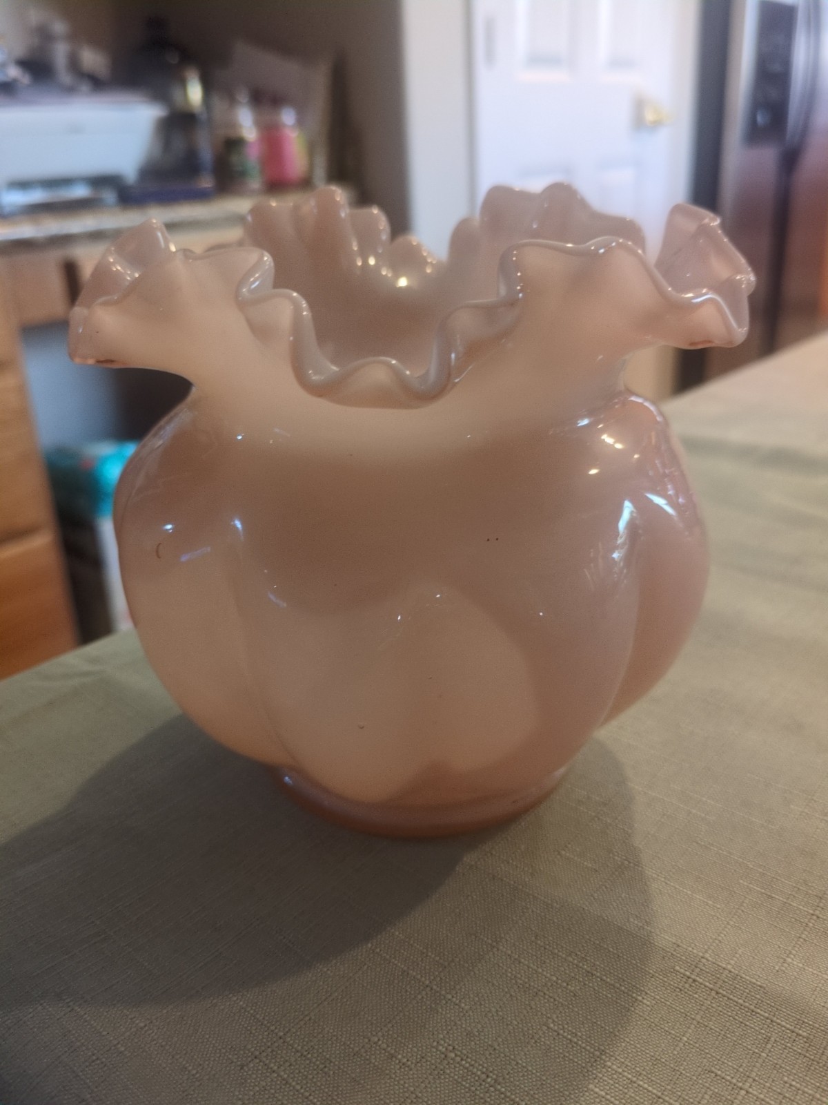 Vintage Fenton cased milk glass rose bowl with a ruffled pink and white finish.