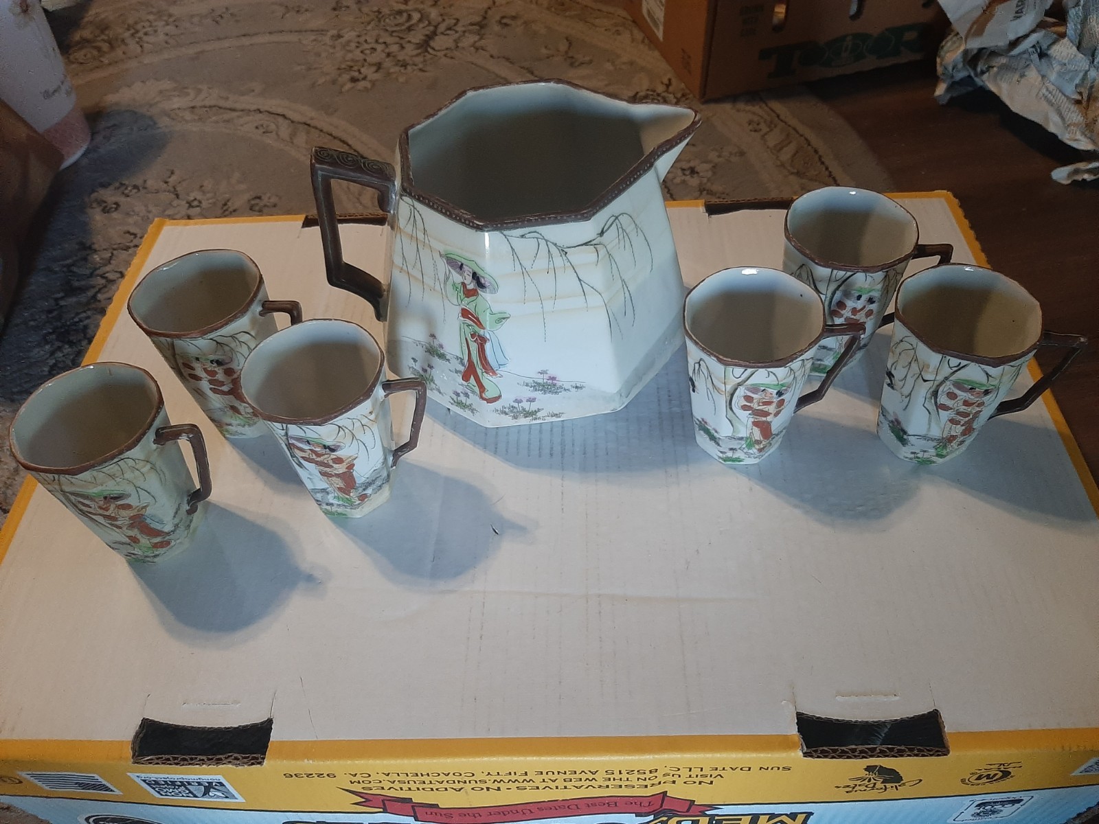 antique japanese pitcher and 6 cups