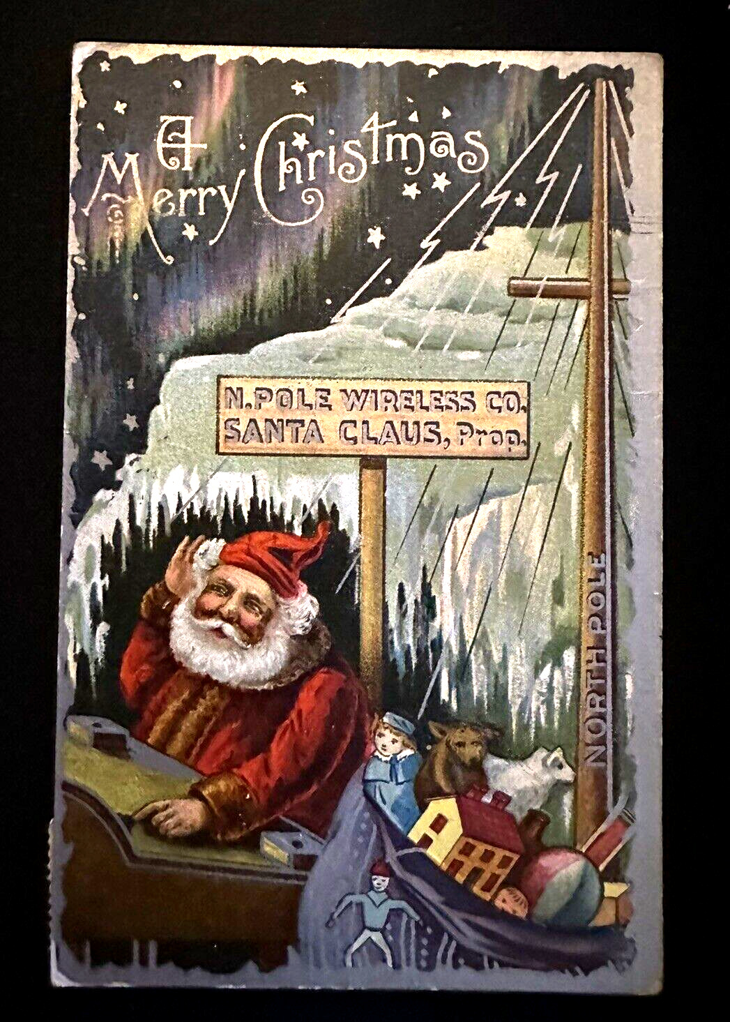 Santa Claus in Sled~Toys North Pole~~Antique Christmas~Postcard~k308