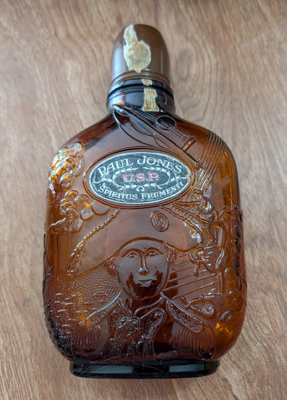 Spiritus Frumenti Paul Jones U.S.P. Embossed Whiskey Flask Empty Spring 1913 Spiritus Frumenti Paul Jones U.S.P. Embossed Whiskey Flask Empty Spring 1913