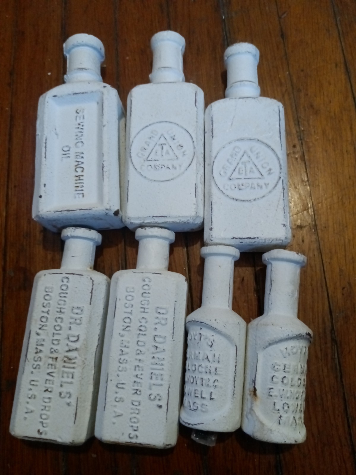 vintage Cast Iron Bottle lot of 7  