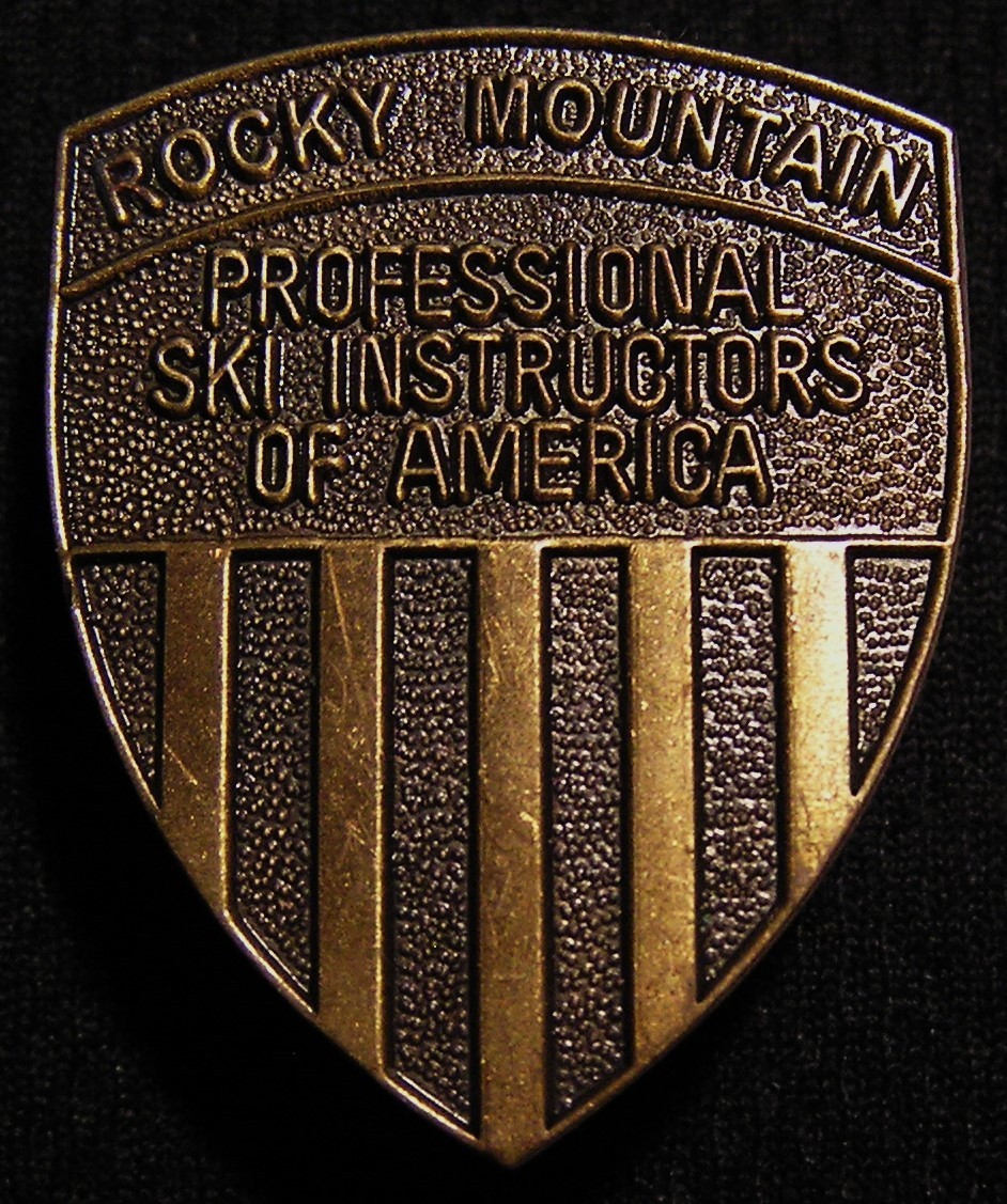 VTG ROCKY MOUNTAIN PROFESSIONAL SKI INSTRUCTORS OF AMERICA PIN BADGE - SKIING