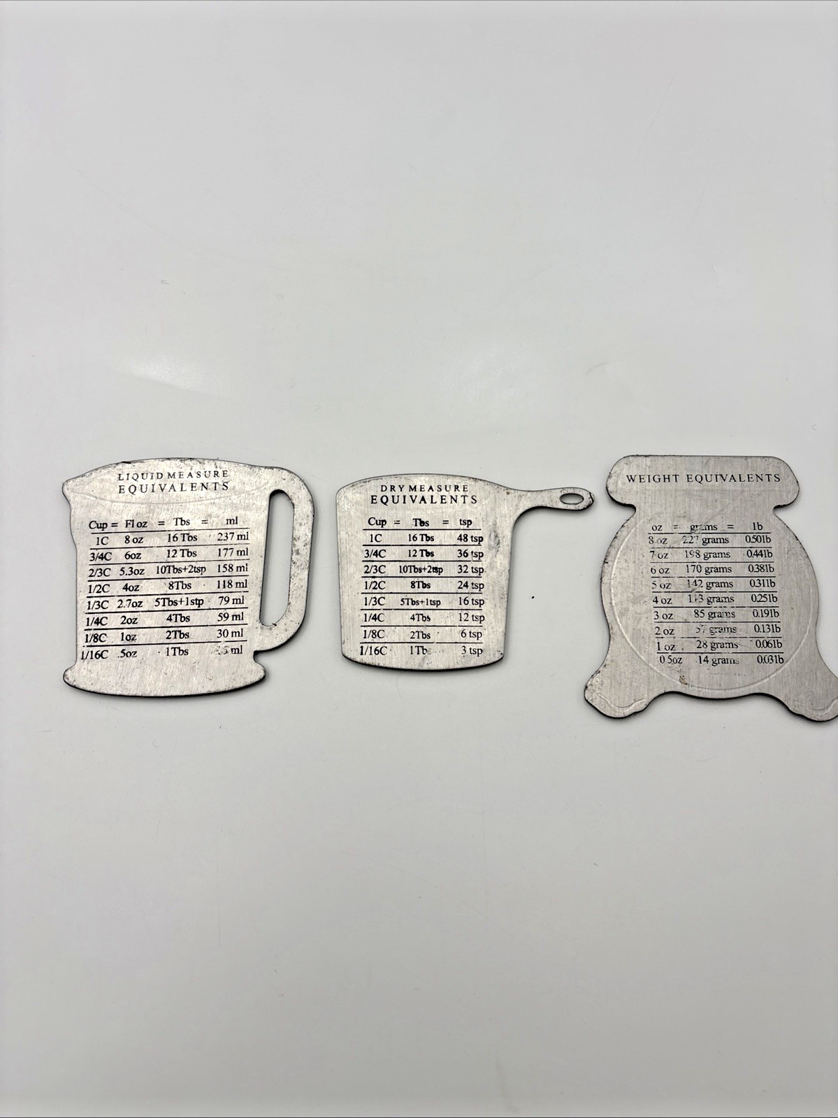 Vintage AMCO Stainless Cooking equivalent Magnets. Vintage AMCO Stainless Cooking equivalent Magnets.