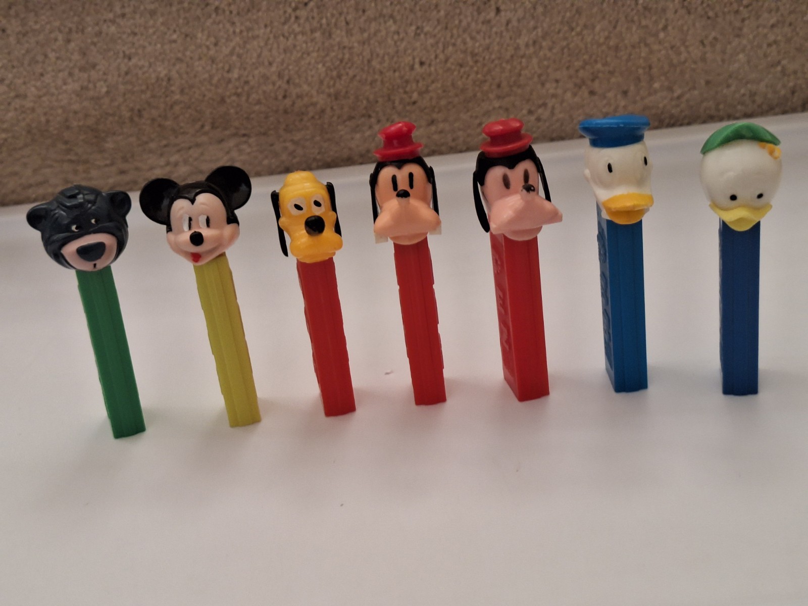 Vintage 1961 thru 1977  Lot Of 7 Disney Pez No Feet Austria & Hong Kong 3.4 &3.9