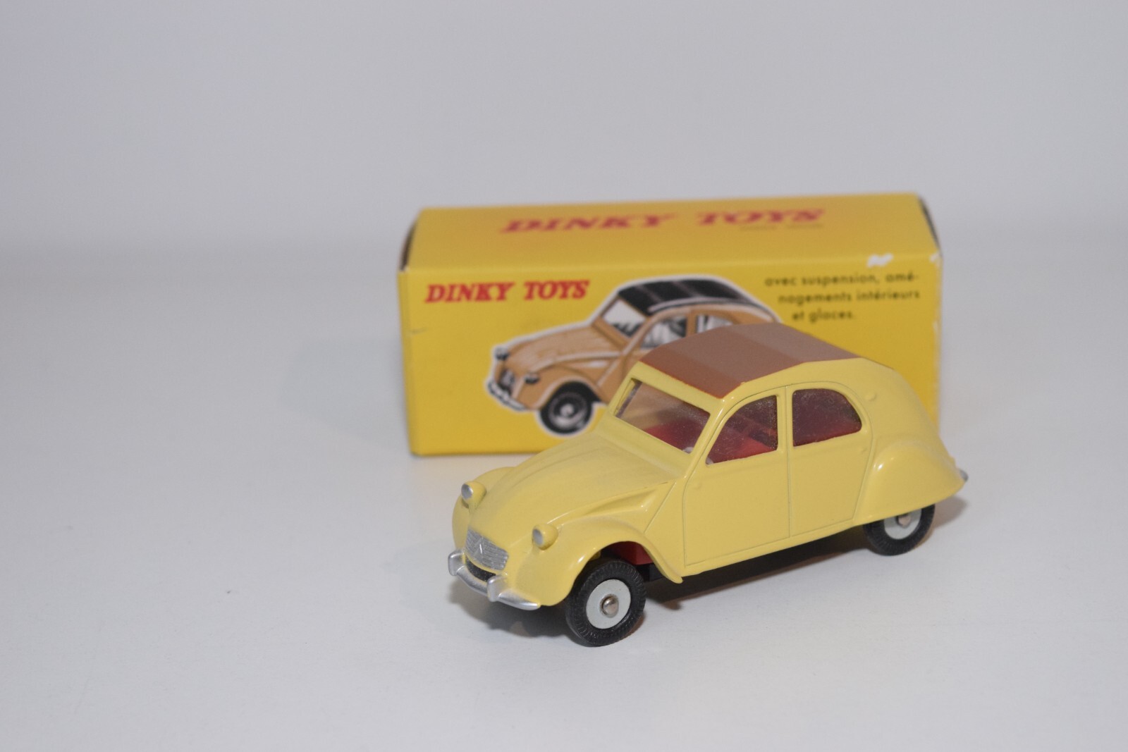 A46 1:43 DINKY TOYS ATLAS 558 CITROEN 2CV MODEL 61 YELLOW BROWN ROOF MIB