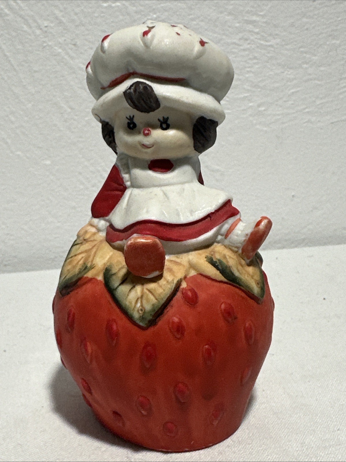 Girl on Strawberry Ceramic Bell Vintage Strawberry Shortcake?
