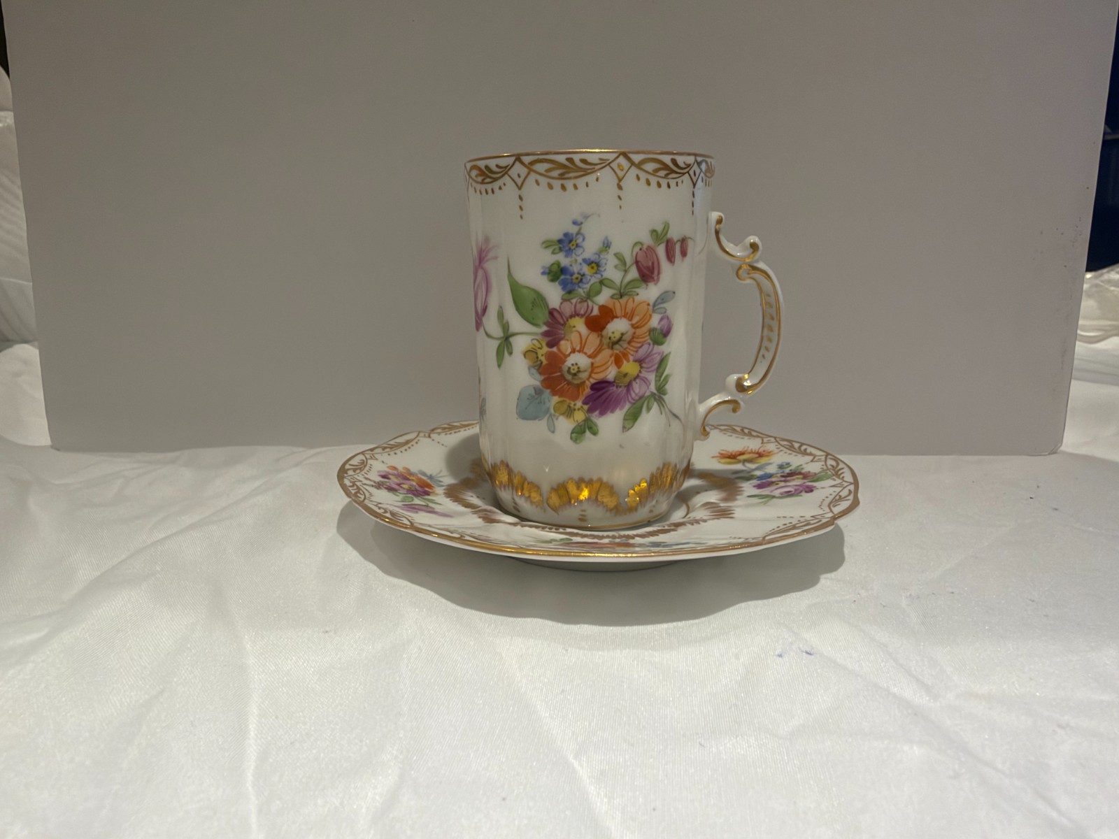 Vintage European Porcelain Demitasse Cup with a Matching Saucer