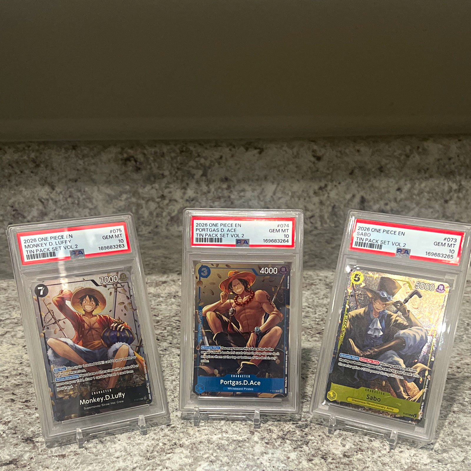 Sequential -2026 One Piece EN Tin Pack Set Vol.2 PSA 10 Graded Luffy Ace Sabo