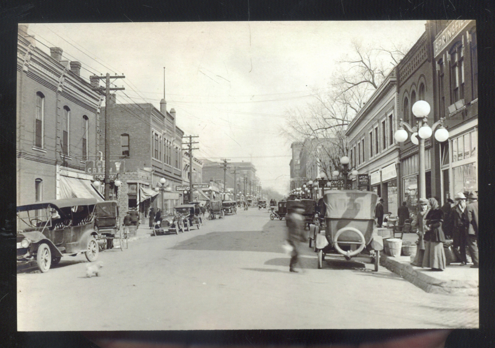 REAL PHOTO SPRINGFIELD MISSOURI DOWNTOWN STREET SCENE OLD CARS POSTCARD COPY