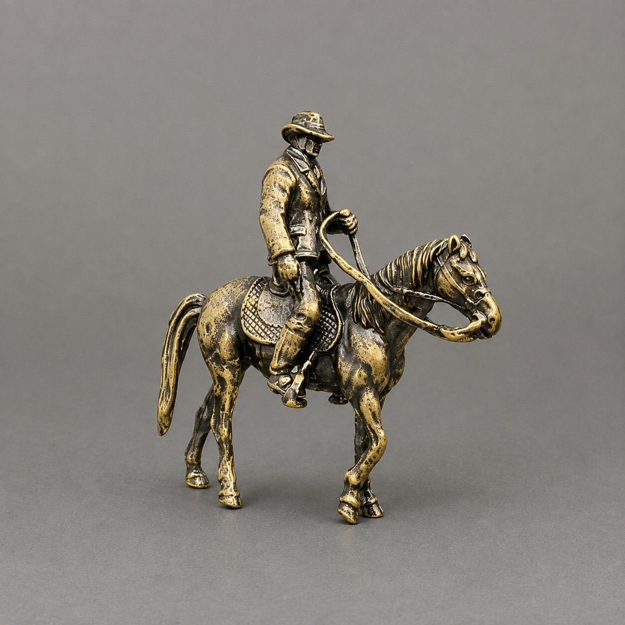 Brass Cowboy on Horse Figurine Brass Cowboy on Horse Figurine