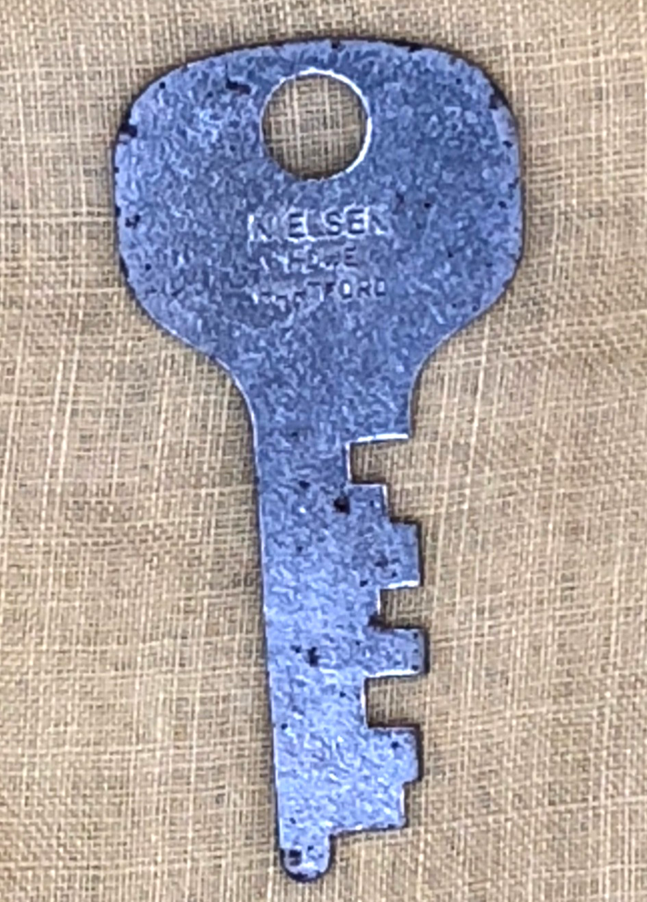 KEY: NIELSEN HOWE HARTFORD FLAT KEY - 1.65” x 0.8” - Vintage